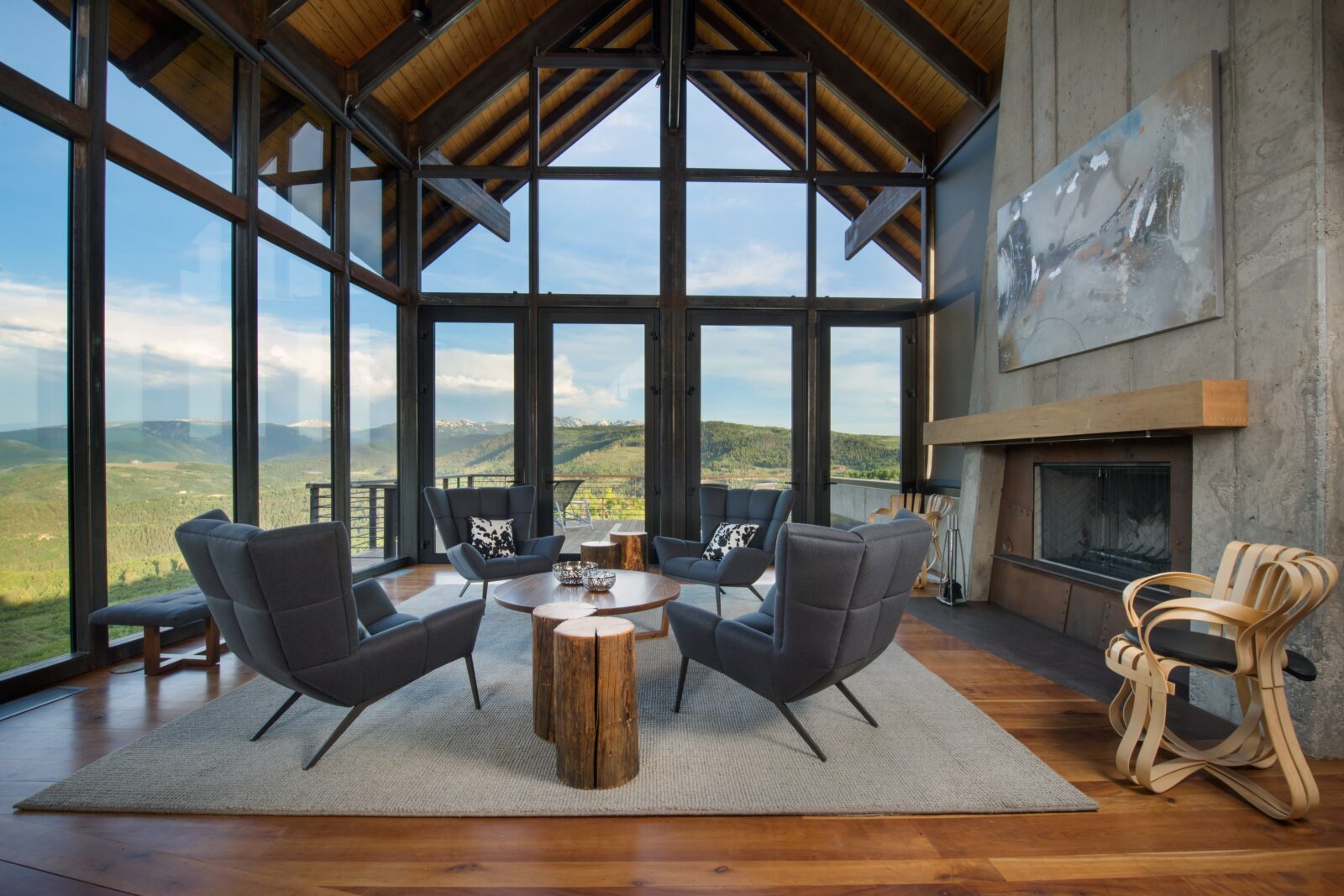 1000 ute forest living room with walls of glass