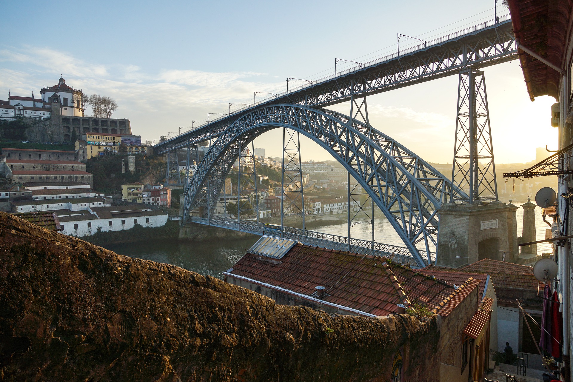 blue industrial bridge crossing over a canal in portugal