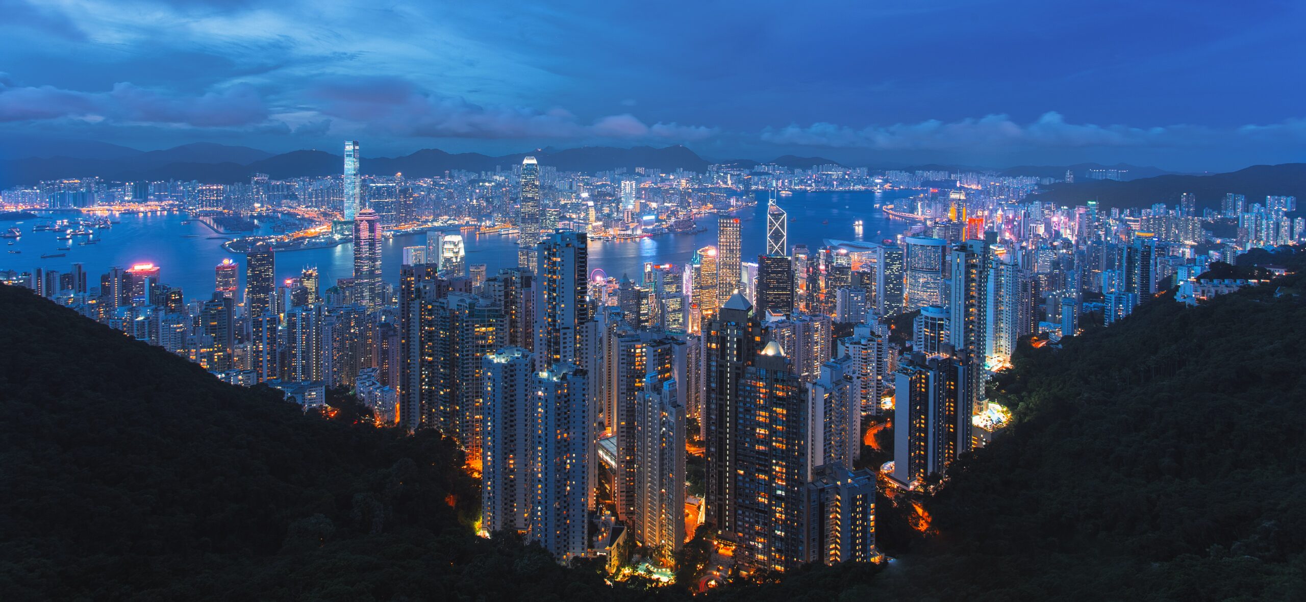 hong kong skyline and waterway at night