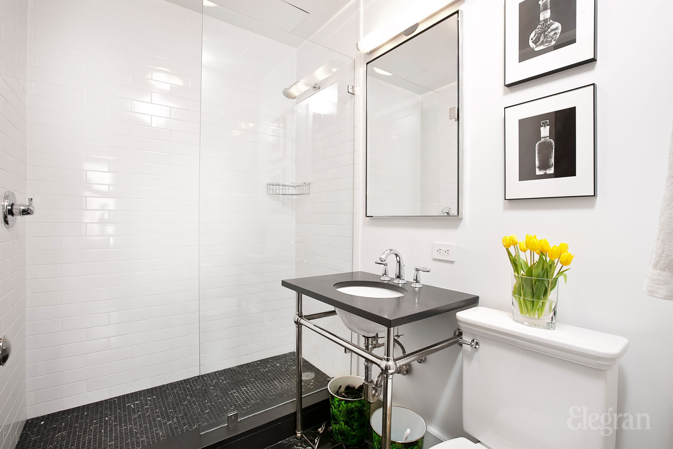 interior view of a sink with exposed pipes