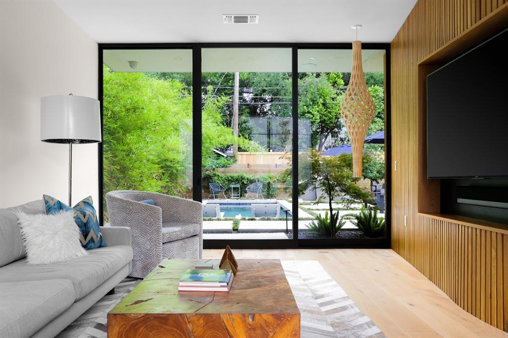 Interior view of a living room with fluted walls.