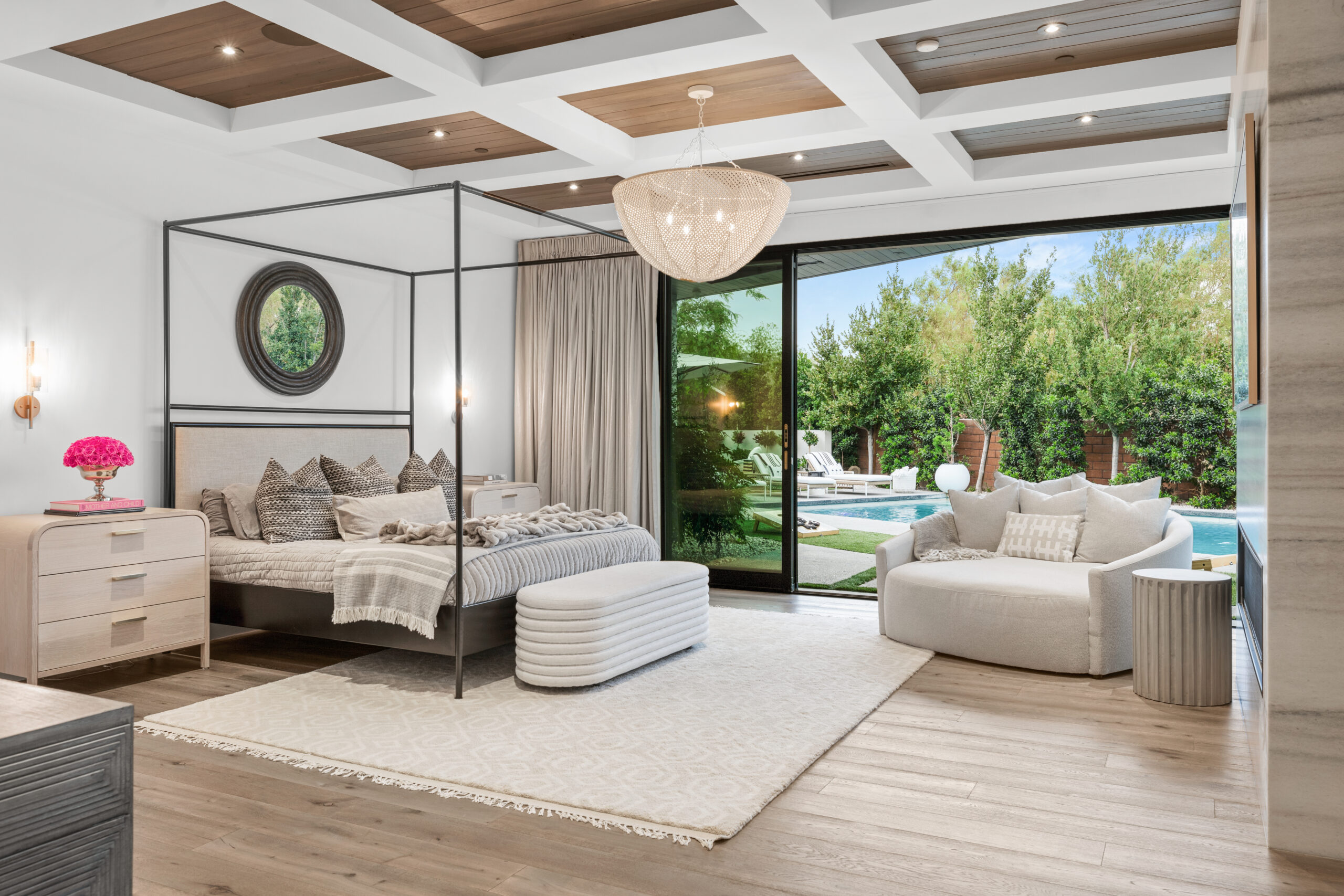 Interior view of a bedroom with scone lighting